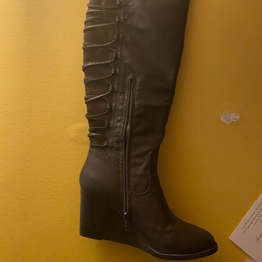 Wedge boots with strapped back